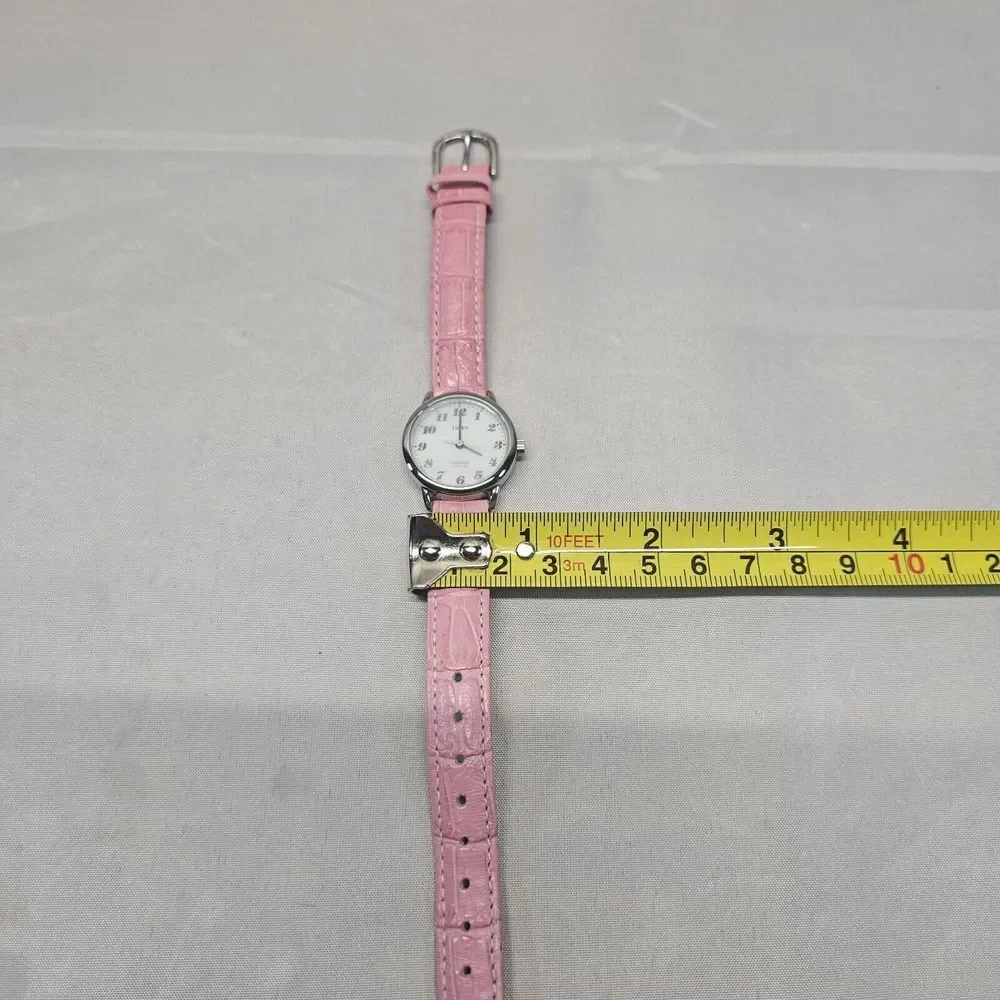 Timex Indiglo women's watch. Classic‎ style face. Pink band Needs Battery